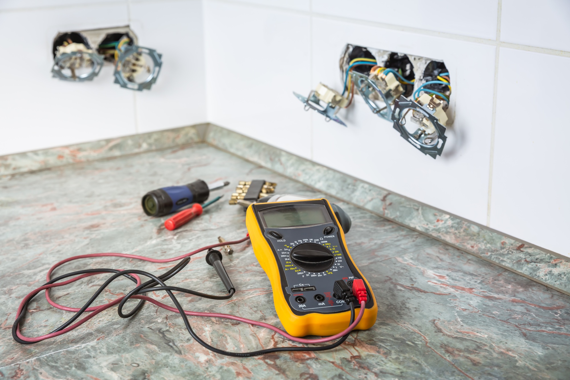 Fixing and repairing broken outlets and socket with tools and ammeter